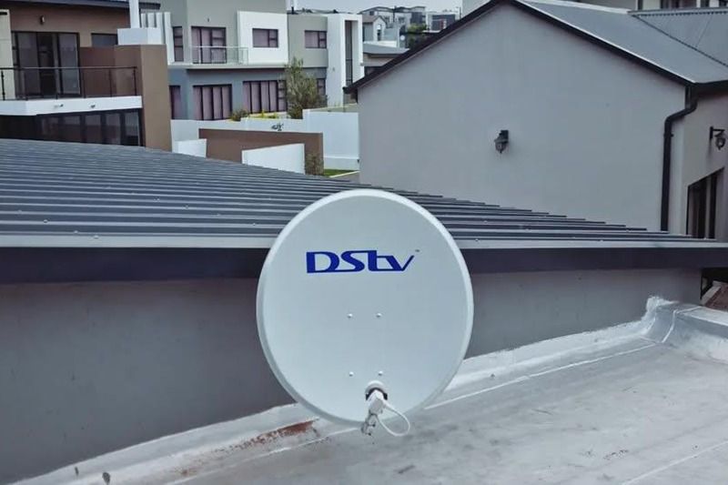 DStv satellite dish installed on a flat roof in the East Rand